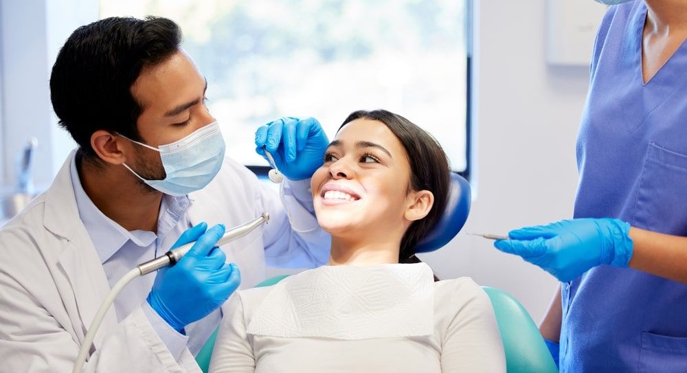 Girl Smiling at Dentist