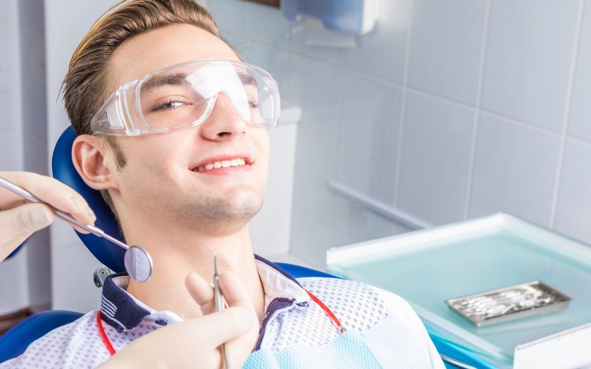 Man Receiving Treatment Smiling